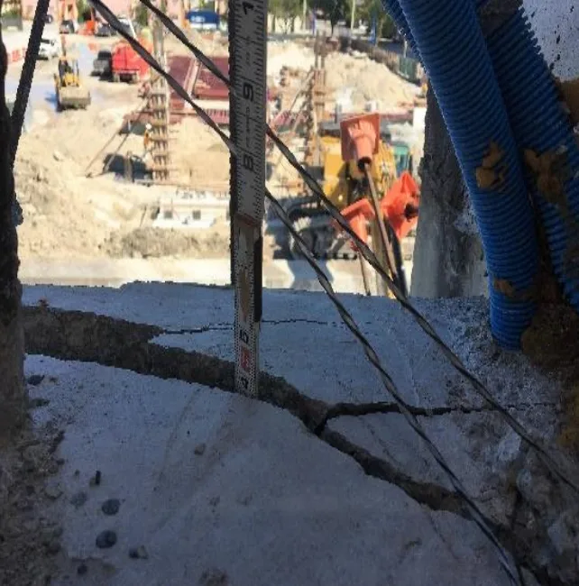 Image of a crack on the FIU Bridge in Miami Florida, Prior to its collapse, an example which shows sometimes the experts may not readily tell if a crack is structural and serios in nature.