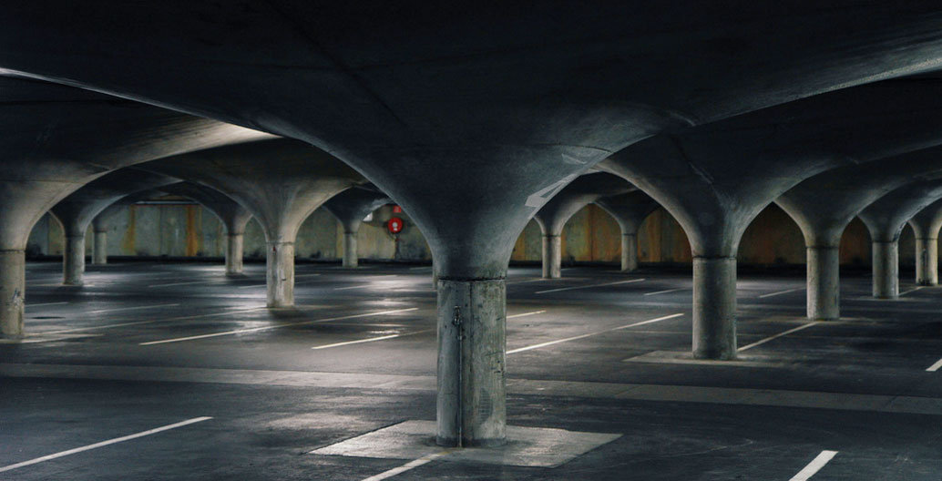 This iconic slab soffit featured in the movie Mad Max and shows an elegant example of a column capital morphing into a drop panel to form almost an arch like structure to support the floor above.