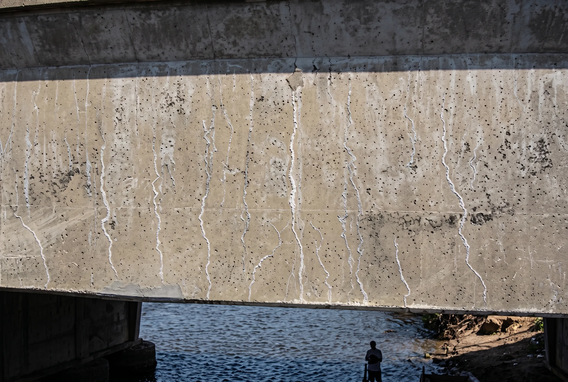 Autogenous healing can be spotted where cracks have turned white, this is the visible calcium which forms as part of Autogenous Healing in concrete.