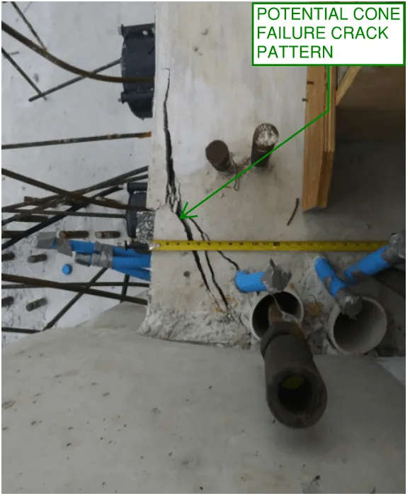 Actual image of the bottom deck at the support node which appears to indicate evidence of cone failure on the FIU pedestrian bridge.