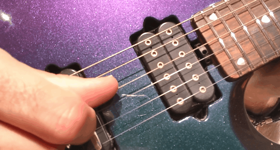 Tension applied to a member tends to have a restorative effect on it for lateral movement. This is demonstrated here on a single guitar string. The guitar string is tensioned to achieve the desired pitch, pulling it in one direction then releasing it results in the string returning back to its original location.