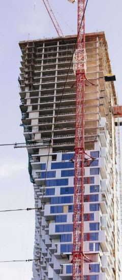 A very extreme case of the Walking Column for a building under construction.