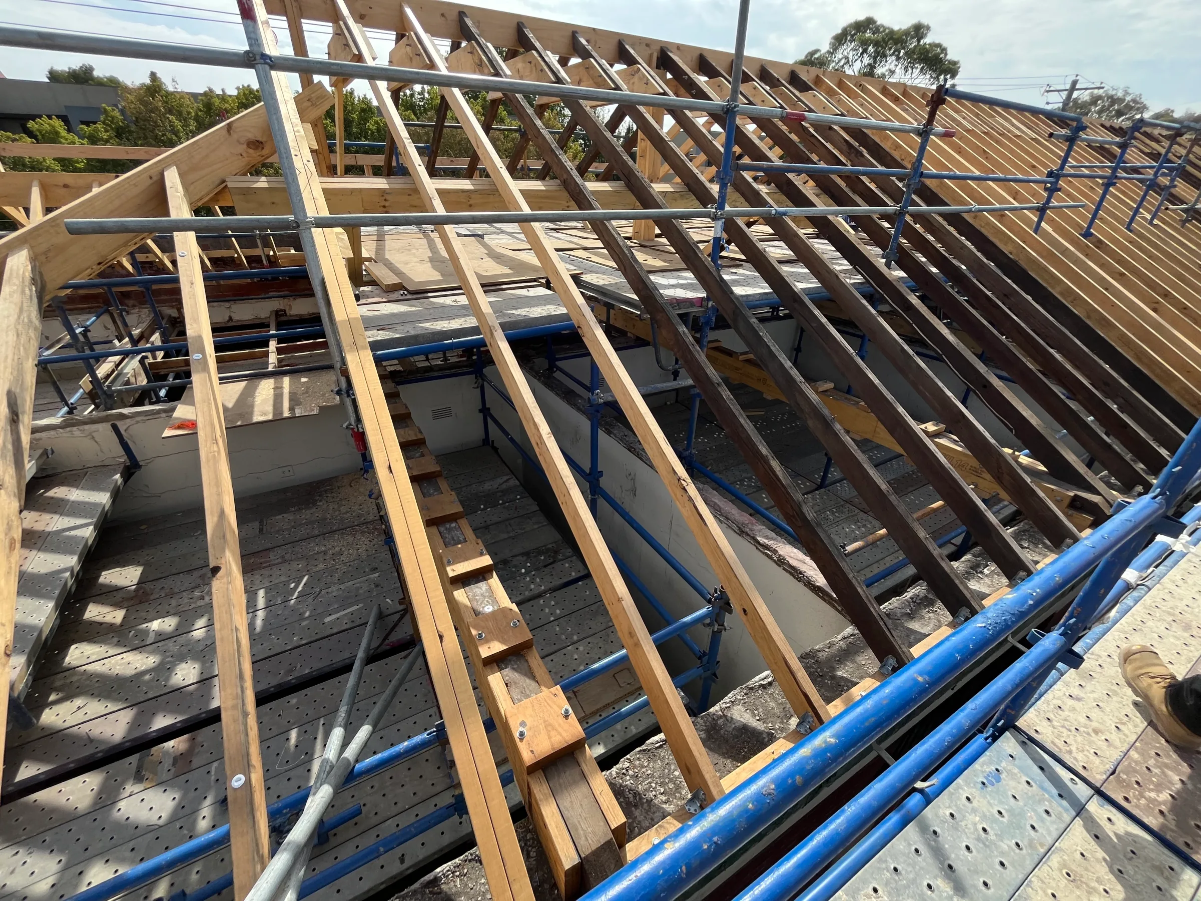 Progress of the restoration works with old and new timbers visbile