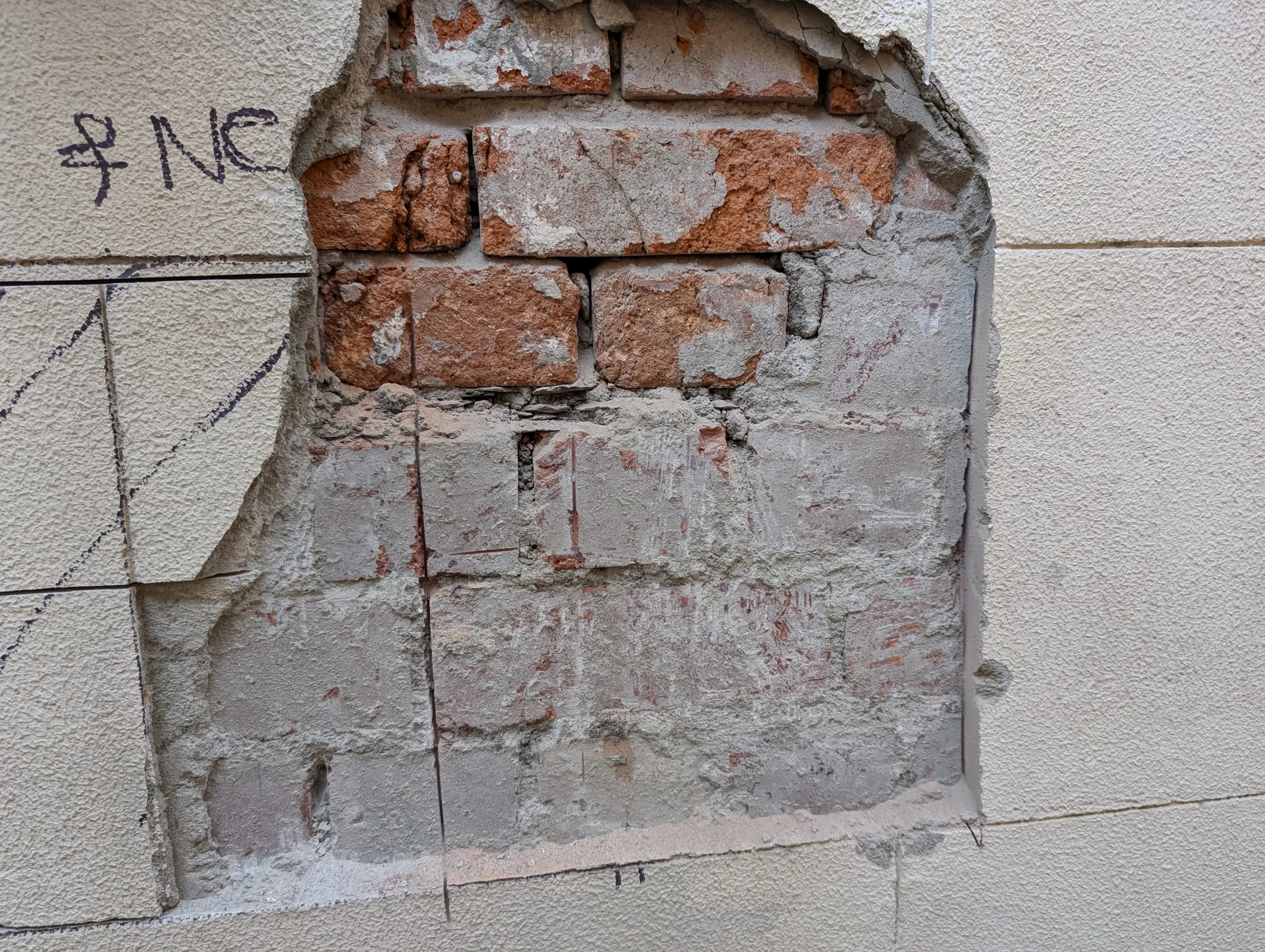 Once the render was removed, the true condition of the mortar became apparent.