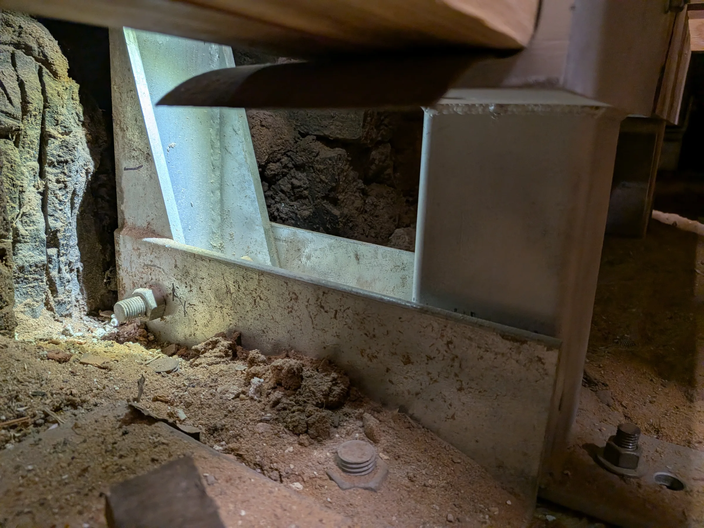 Seismic bracket located within the buildings sub-floor