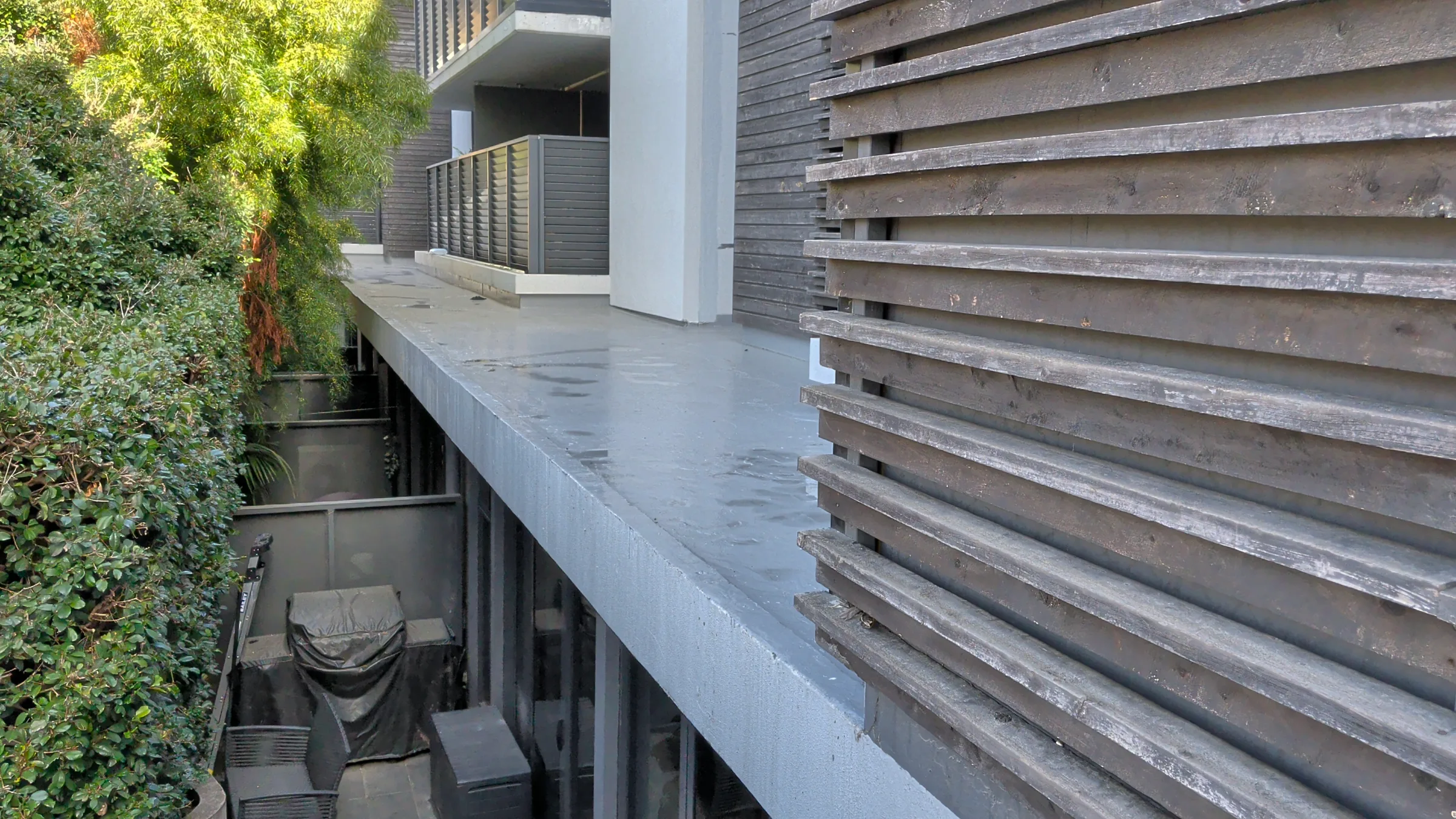 Undamaged area within a similar section compared to the damaged section of the building.