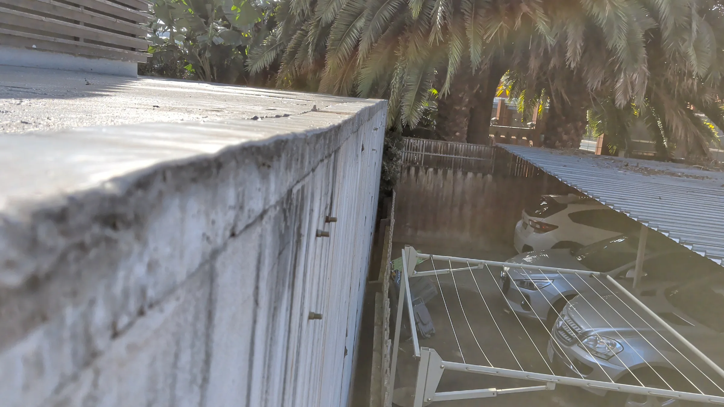 Comparing the damaged area with a similar section elsewhere on the building.