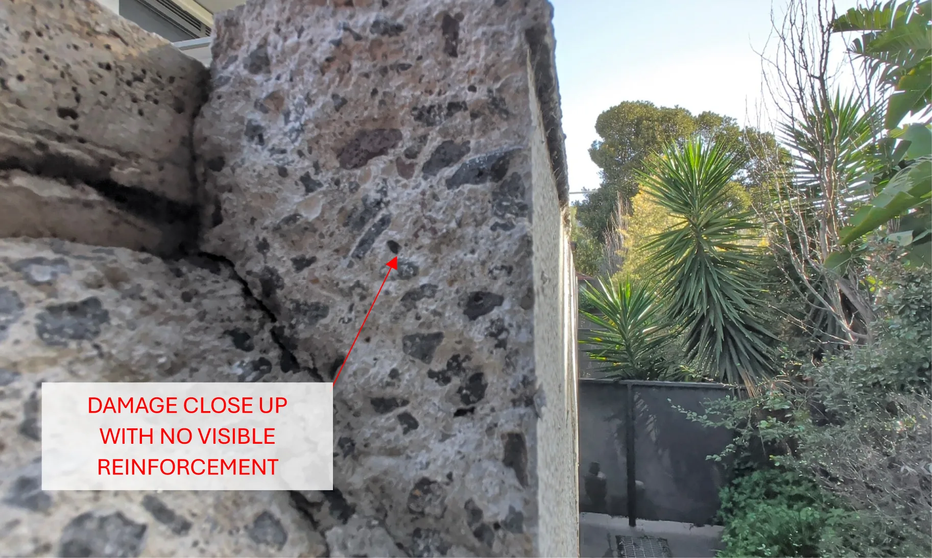 Close-up of the damaged concrete where no visible reinforcement could be identified.