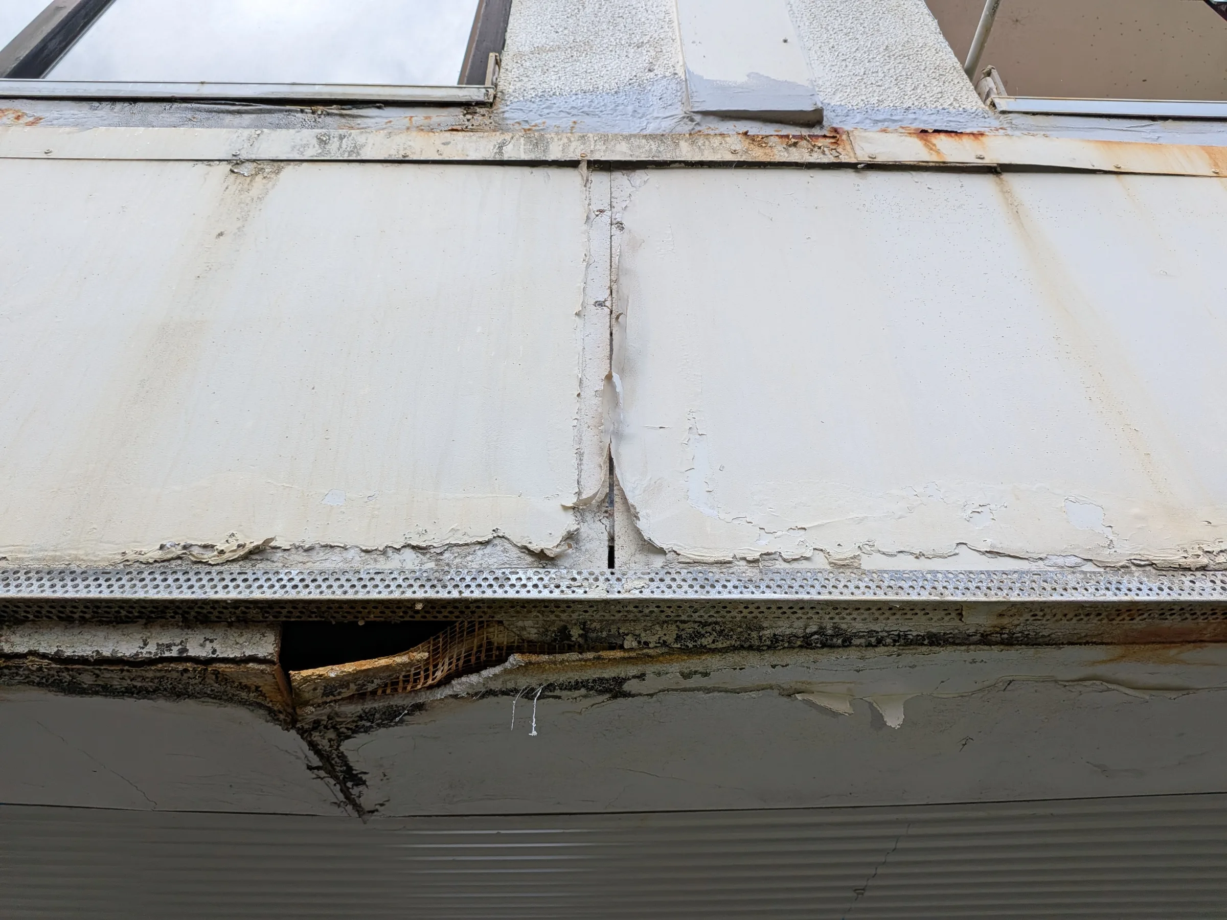 Signs that moisture was bypassing the intended weatherproofing system.