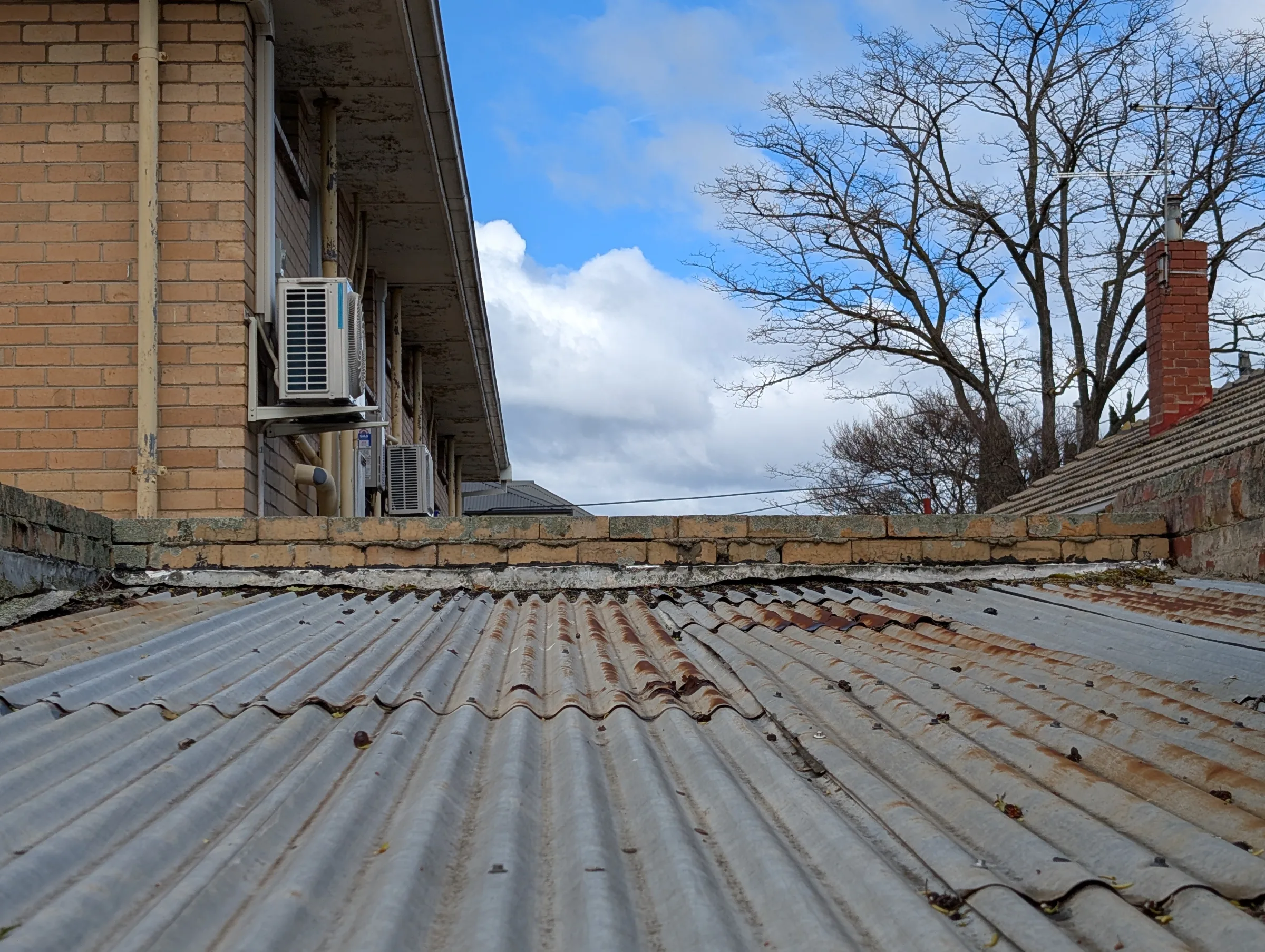 Deteriorated roof elements that may contribute to ongoing moisture exposure.