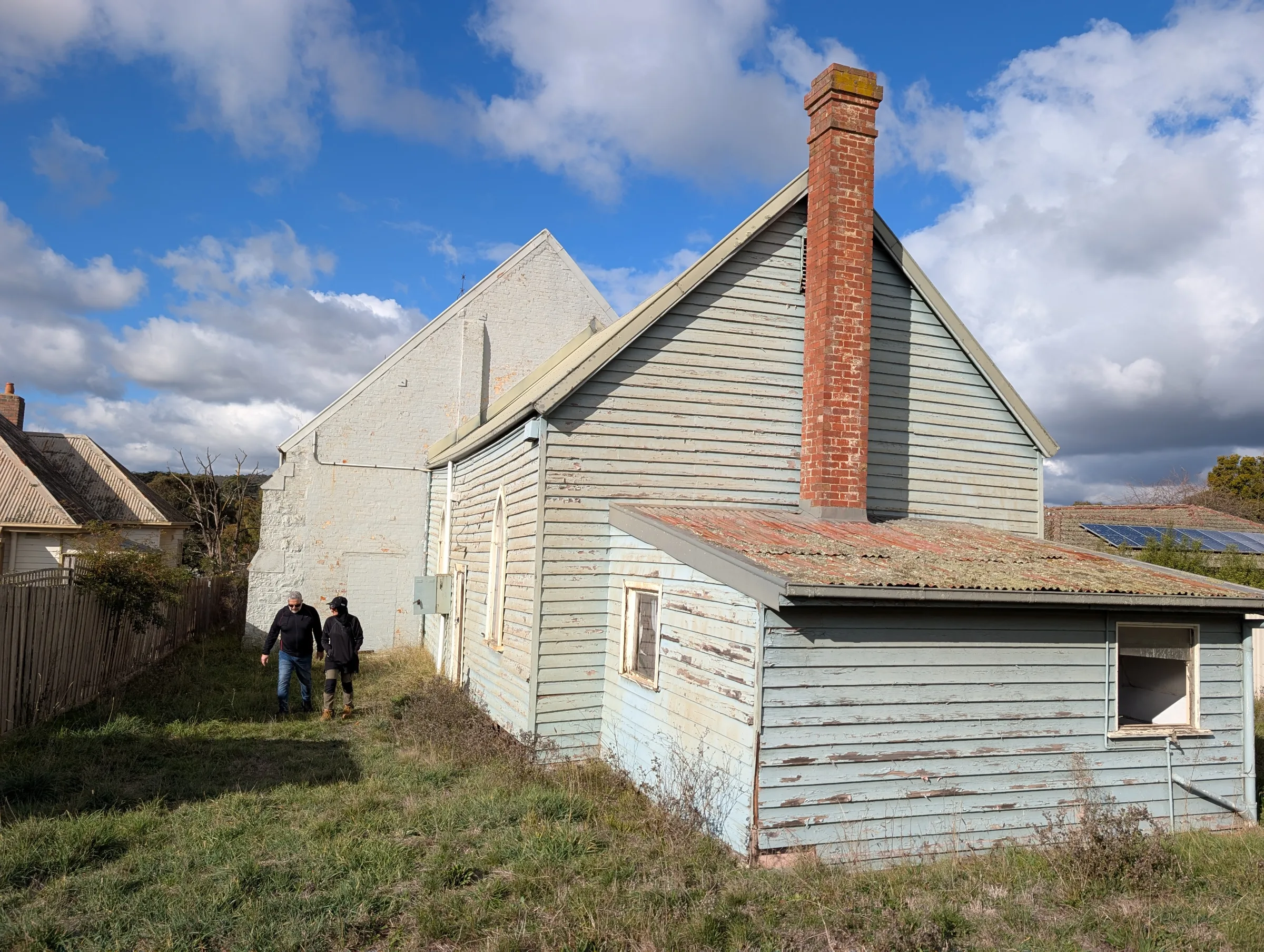 The historic church and later additions at the time of inspection.
