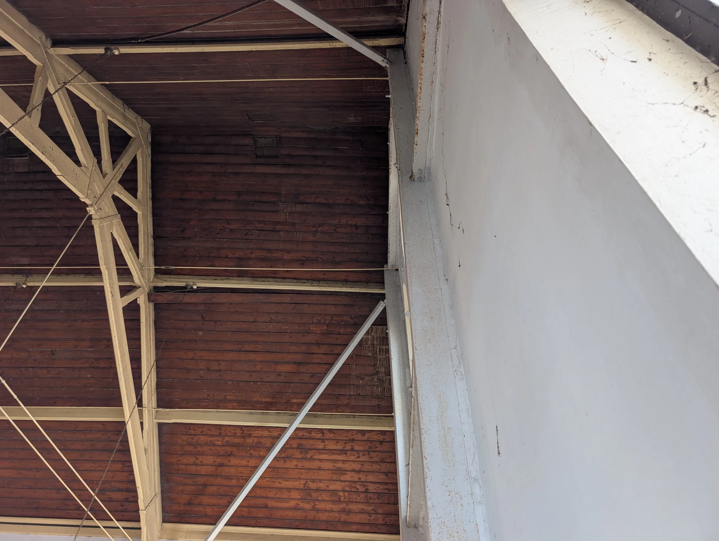 Evidence of previous attempts to stabilise movement in the masonry wall.