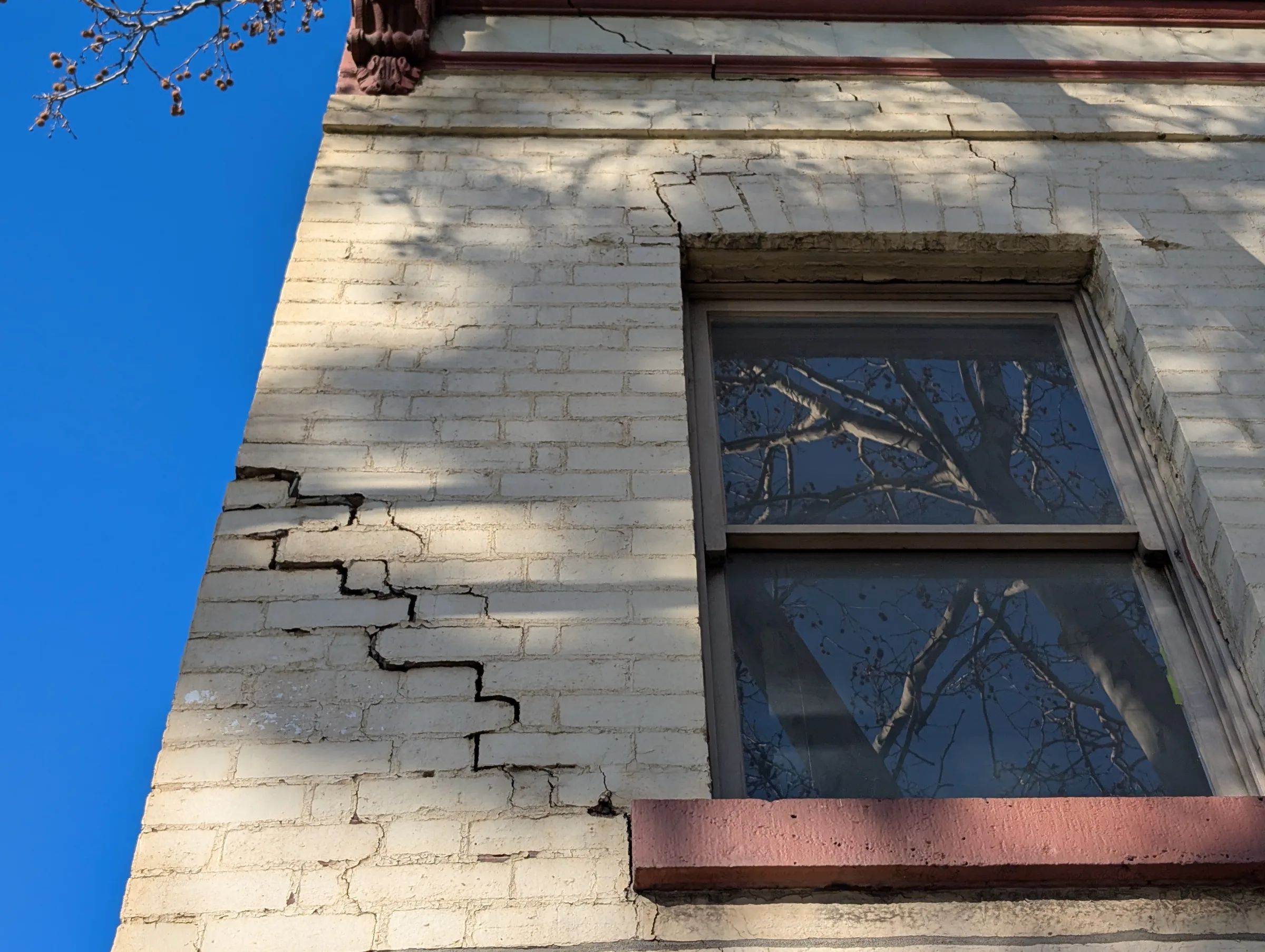 Cracking in Heritage Masonry Buildings: Why the Obvious Answer Was Wrong